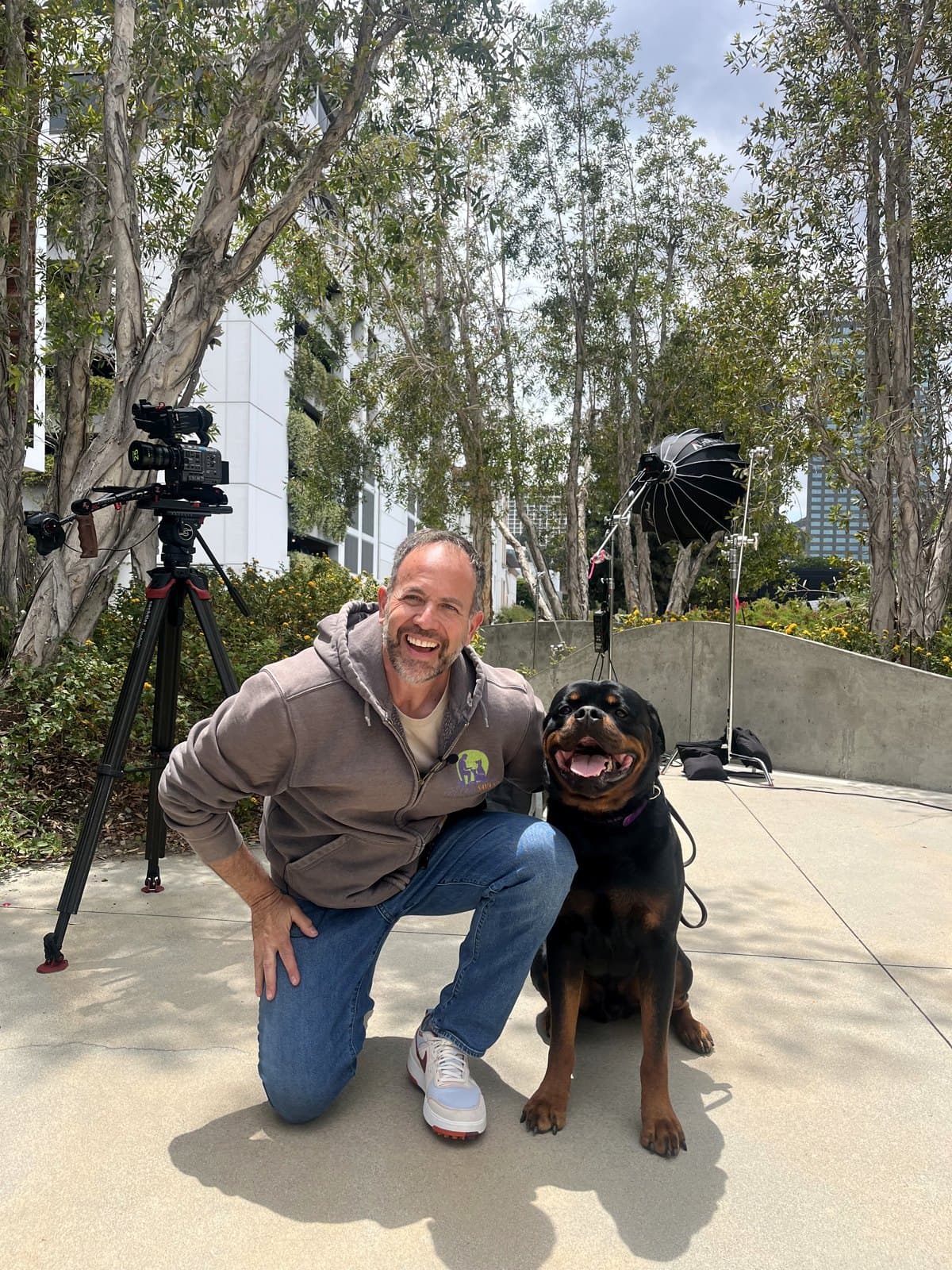 Brett Endes with a calm, attentive Rottweiler during an Anchorage training session